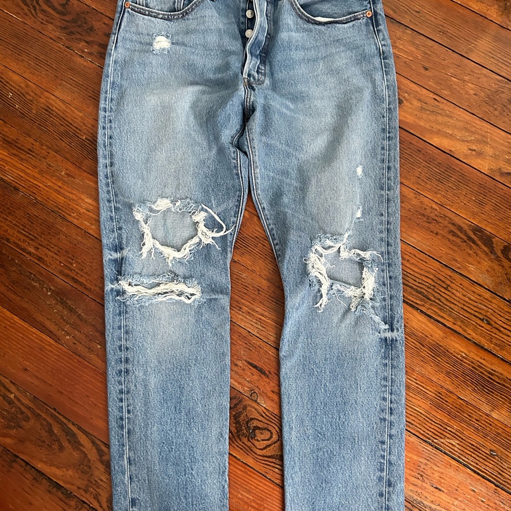 Levi’s 501 distressed denim pants